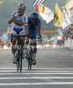 Second placed Betancur Gomez Carlos Alberto of Colombia celebrating his medal when crossing finish line of Men U23 UCI Road cycling World Championships road race in Mendrisio, Switzerland. 179.4km long Men U23 road race was held in Mendrisio, Switzerland, on 26th of September 2009.
