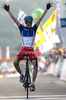 Winner Romain Sicard of France celebrating his victory when crossing finish line of Men U23 UCI Road cycling World Championships road race in Mendrisio, Switzerland. 179.4km long Men U23 road race was held in Mendrisio, Switzerland, on 26th of September 2009.
