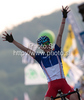 Winner Romain Sicard of France celebrating his victory when crossing finish line of Men U23 UCI Road cycling World Championships road race in Mendrisio, Switzerland. 179.4km long Men U23 road race was held in Mendrisio, Switzerland, on 26th of September 2009.
