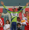 Winner of the Giro di Italia 2010 Ivan Basso of Italy (Liquigas Doimo) at the flower ceremony of the individual time trial of the final 21st stage of Giro dItalia at Verona. The individual time trial was 15 km long. The final 21st stage of Giro dItalia 2010 at Verona was held on Sunday, 30th of May 2010 in Italy.
