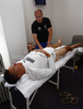 Physio preparing cyclist day before first stage of Tour de Slovenie 2010. Teams are getting ready on start of race in Koper, Slovenia, on Wednesday, 16th of June 2010.

