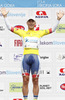 Winner Svein Tuft of Canada (Team Orica - GreenEDGE) in the yellow jersey as the best rider in the general classification at the flower ceremony of the individual time trial at the the first stage of Tour de Slovenie 2013. The first stage in Ljubljana centre was 8,8 km long and it was held on Thursday, 13th of June, 2013 in Ljubljana, Slovenia.
