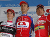 Winner Radoslav Rogina of Croatia (Team Adria Mobil) in the middle, second placed Jan Polanc of Slovenia (Team Radenska) at left and third placed Patrik Sinkewitz of Germany (Team Meridiana Kamen) at right at the flower ceremony of the third stage of Tour de Slovenie 2013. The third stage from Skofja Loka to Vrsic was 170 km long and it was held on Saturday, 15th of June, 2013 in Slovenia.
