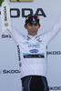 Michal Kwiatkowski of Poland (Team Omega Pharma â€“ Quick Step) in white jersey at the flower ceremony of the second stage of 100th Tour de France 2013. The second stage from Bastia to Ajaccio was 156 km long and it was held on Sunday, 30th of June, 2013 in Corsica, France.
