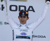 Michal Kwiatkowski of Poland (Team Omega Pharma â€“ Quick Step) in white jersey at the flower ceremony of the second stage of 100th Tour de France 2013. The second stage from Bastia to Ajaccio was 156 km long and it was held on Sunday, 30th of June, 2013 in Corsica, France.
