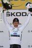Michal Kwiatkowski of Poland (Team Omega Pharma â€“ Quick Step) in white jersey as the best young rider in classification at the flower ceremony of the third stage of 100th Tour de France 2013. The third stage from Ajaccio to Calvi was 145,5 km long and it was held on Monday, 1st of July, 2013 in Corsica, France.
