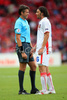 Referee Roberto Rosetti of Italy, left, talks to Czech Republics defender Marek Jankulovski during the Euro 2008 Group A soccer match between Switzerland and Czech Republic at the St. Jakob Park (Joggeli) stadium in Basel, Switzerland, Saturday June 7, 2008. <br> 
