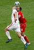 Czech Republics forward Jan Koller, left, fights for the ball with Switzerlands defender Patrick Mueller during the Euro 2008 Group A soccer match between Switzerland and Czech Republic at the St. Jakob Park (Joggeli) stadium in Basel, Switzerland, Saturday June 7, 2008.
