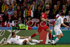 From left Turkeys defender Sabri Sarioglu, Portugals forward Cristiano Ronaldo and Turkeys defender Emre Asik during the Euro 2008 Group A soccer match between Portugal and Turkey at the Stade de Geneve stadium in Geneva, Switzerland, Saturday June 7, 2008.
