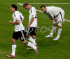 Germanys forward Mario Gomez, left, and forward Lukas Podolski react after scoring against Poland while Polands goalkeeper Artur Boruc looks on during the Euro 2008 Group B soccer match between Germany and Poland at the Woerthersee stadium in Klagenfurt, Austria, Sunday June 8, 2008.
