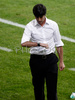 Germanys coach Joachim Loew takes a look at his watch during the Euro 2008 Group B soccer match between Germany and Poland at the Woerthersee stadium in Klagenfurt, Austria, Sunday June 8, 2008.
