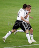 Germanys forward Lukas Podolski, right, celebrates with his teammate Miroslav Klose after scoring his second gol against Poland during the Euro 2008 Group B soccer match between Germany and Poland at the Woerthersee stadium in Klagenfurt, Austria, Sunday June 8, 2008.
