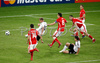 Germanys forward Lukas Podolski kicks the ball to score his second goal against Poland during the Euro 2008 Group B soccer match between Germany and Poland at the Woerthersee stadium in Klagenfurt, Austria, Sunday June 8, 2008.
