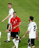 Germanys forward Lukas Podolski, center, celebrates with his teammates Per Mertesacker and  Christoph Metzelder after winning against Poland at the Euro 2008 Group B soccer match between Germany and Poland at the Woerthersee stadium in Klagenfurt, Austria, Sunday June 8, 2008.
