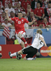 Germanys defender Marcell Jansen challenges Polands defender Marcin Wasilewski during the Euro 2008 Group B soccer match between Germany and Poland at the Woerthersee stadium in Klagenfurt, Austria, Sunday June 8, 2008.
