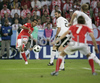 Polands midfielder Roger Guerreiro kicks the ball during the Euro 2008 Group B soccer match between Germany and Poland at the Woerthersee stadium in Klagenfurt, Austria, Sunday June 8, 2008.
