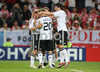Germanys forward Lukas Podolski celebrates with his team after scoring against Poland during the Euro 2008 Group B soccer match between Germany and Poland at the Woerthersee stadium in Klagenfurt, Austria, Sunday June 8, 2008.
