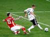 Germanys forward Lukas Podolski kicks the ball to score against Poland during the Euro 2008 Group B soccer match between Germany and Poland at the Woerthersee stadium in Klagenfurt, Austria, Sunday June 8, 2008.
