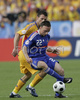 Frances midfielder Franck Ribery, front, fights for the ball with Romanias defender Razvan Rat during the Euro 2008 Group C soccer match between Romania and France at the Letzigrund stadium in Zurich, Switzerland, Monday June 9, 2008.
