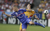 Frances forward Karim Benzema, left, fights for the ball with Romanias defender Cristian Chivu during the Euro 2008 Group C soccer match between Romania and France at the Letzigrund stadium in Zurich, Switzerland, Monday June 9, 2008.
