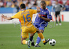 Romanias midfielder Banel Nicolita, left, fights for the ball with Frances midfielder Florent Malouda during the Euro 2008 Group C soccer match between Romania and France at the Letzigrund stadium in Zurich, Switzerland, Monday June 9, 2008.
