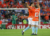 Netherlands forward Ruud van Nistelrooy, back, celebrates with Netherlands midfielder Wesley Sneijder after scoring gainst Italy during the Euro 2008 Group C soccer match between Netherlands and Italy at the Stade de Suisse stadium in Berne, Switzerland, Monday June 9, 2008.
