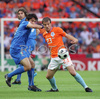 Italys midfielder Gennaro Gattuso, left, fights for the ball with Netherlands midfielder Rafael van der Vaart during the Euro 2008 Group C soccer match between Netherlands and Italy at the Stade de Suisse stadium in Berne, Switzerland, Monday June 9, 2008.
