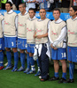 Italys injured team captain Fabio Cannavaro, center, assists the match with his teammates during the Euro 2008 Group C soccer match between Netherlands and Italy at the Stade de Suisse stadium in Berne, Switzerland, Monday June 9, 2008.
