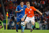 Italys defender Marco Materazzi, left, fights for the ball with Netherlands forward Dirk Kuyt during the Euro 2008 Group C soccer match between Netherlands and Italy at the Stade de Suisse stadium in Berne, Switzerland, Monday June 9, 2008.
