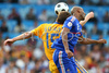 Romanias defender Dorin Goian, left, fights for the ball with Frances forward Nicolas Anelka during the Euro 2008 Group C soccer match between Romania and France at the Letzigrund stadium in Zurich, Switzerland, Monday June 9, 2008.
