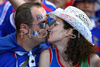 Frances fan kiss prior to the Euro 2008 Group C soccer match between Romania and France at the Letzigrund stadium in Zurich, Switzerland, Monday June 9, 2008.
