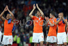 Netherlands midfielder Nigel de Jong, forward Ruud van Nistelrooy, Robin van Persie and defender Johnny Heitinga (from left) celebrate after winning against Italy at the Euro 2008 Group C soccer match between Netherlands and Italy at the Stade de Suisse stadium in Berne, Switzerland, Monday June 9, 2008.

