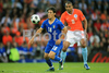 Italys midfielder Mauro Camoranesi, left, controls the ball while Netherlands midfielder Orlando Engelaar looks on during the Euro 2008 Group C soccer match between Netherlands and Italy at the Stade de Suisse stadium in Berne, Switzerland, Monday June 9, 2008.
