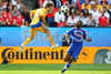 Romanias forward Adrian Mutu, left, heads the ball while Frances defender William Gallas looks on during the Euro 2008 Group C soccer match between Romania and France at the Letzigrund stadium in Zurich, Switzerland, Monday June 9, 2008.
