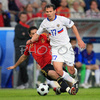 Russias midfielder Konstantin Zyrianov, front, fights for the ball with Spains defender Joan Capdevila during the Euro 2008 Group D soccer match between Spain and Russia at the Tivoli Neu stadium in Innsbruck, Austria, Tuesday June 10, 2008.
