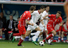 Czech Republics midfielder Jan Polak, Portugals forward Cristiano Ronaldo and Czech Republics forward Libor Sionko, from left, fight for the ball during the Euro 2008 Group A soccer match between Czech Republic and Portugal at the Stade de Geneve stadium in Geneva, Switzerland, Wednesday June 11, 2008.
