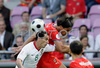 Portugals midfielder Petit, left, and Czech Republics forward Milan Baros fight for the ball during the Euro 2008 Group A soccer match between Czech Republic and Portugal at the Stade de Geneve stadium in Geneva, Switzerland, Wednesday June 11, 2008.
