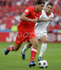 Czech Republics forward Milan Baros, left, fights for the ball Portugals forward Ricardo Quaresma during the Euro 2008 Group A soccer match between Czech Republic and Portugal at the Stade de Geneve stadium in Geneva, Switzerland, Wednesday June 11, 2008.
