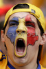 A Romanian fan cheers before the Euro 2008 Group C soccer match between Italy and Romania at the Letzigrund stadium in Zurich, Switzerland, Friday June 13, 2008.
