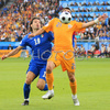 Italys defender Gianluca Zambrotta, left, fights for the ball with Romanias forward Daniel Niculae during the Euro 2008 Group C soccer match between Italy and Romania at the Letzigrund stadium in Zurich, Switzerland, Friday June 13, 2008.

