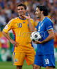 Italys defender Gianluca Zambrotta, right, touches Romanias forward Adrian Mutu during the Euro 2008 Group C soccer match between Italy and Romania at the Letzigrund stadium in Zurich, Switzerland, Friday June 13, 2008.
