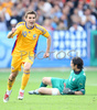 Romanias forward Adrian Mutu reacts after scoring against Italy while Italys goalkeeper Gianluigi Buffon lies on the ground during the Euro 2008 Group C soccer match between Italy and Romania at the Letzigrund stadium in Zurich, Switzerland, Friday June 13, 2008.
