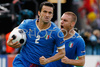 Italys defender Christian Panucci reacts after scoring against Romania while Italys midfielder Daniele De Rossi celebrates during the Euro 2008 Group C soccer match between Italy and Romania at the Letzigrund stadium in Zurich, Switzerland, Friday June 13, 2008.
