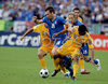 Italys forward Antonio Cassano, left, fights for the ball with Romanias midfielder Banel Nicolita during the Euro 2008 Group C soccer match between Italy and Romania at the Letzigrund stadium in Zurich, Switzerland, Friday June 13, 2008.
