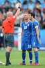 Italys midfielder Daniele De Rossi gets a yellow card from Referee Tom Henning of Norway while Italys defender Christian Panucci, right, looks on during the Euro 2008 Group C soccer match between Italy and Romania at the Letzigrund stadium in Zurich, Switzerland, Friday June 13, 2008.
