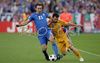 Italys midfielder Andrea Pirlo, left, fights for the ball with Romanias defender Razvan Rat during the Euro 2008 Group C soccer match between Italy and Romania at the Letzigrund stadium in Zurich, Switzerland, Friday June 13, 2008.
