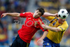 Spains forward David Villa, left, fights for the ball with Swedens defender Petter Hansson during the Euro 2008 Group D soccer match between Sweden and Spain at the Tivoli Neu stadium in Innsbruck, Austria, Saturday June 14, 2008.
