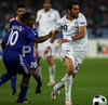 Italys Simone Perrotta, right, is chased by Frances Sidney Govou during the Euro 2008 Group C soccer match between France and Italy at the Letzigrund stadium in Zurich, Switzerland, Tuesday, June 17, 2008.
