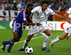 Frances Sidney Govou, left, fights for the ball with Italys Fabio Grosso during the Euro 2008 Group C soccer match between France and Italy at the Letzigrund stadium in Zurich, Switzerland, Tuesday, June 17, 2008.
