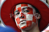 A Croatian fan waits before the Euro 2008 Group B soccer match between Poland and Croatia at the Woerthersee stadium in Klagenfurt, Austria, Monday June 16, 2008.
